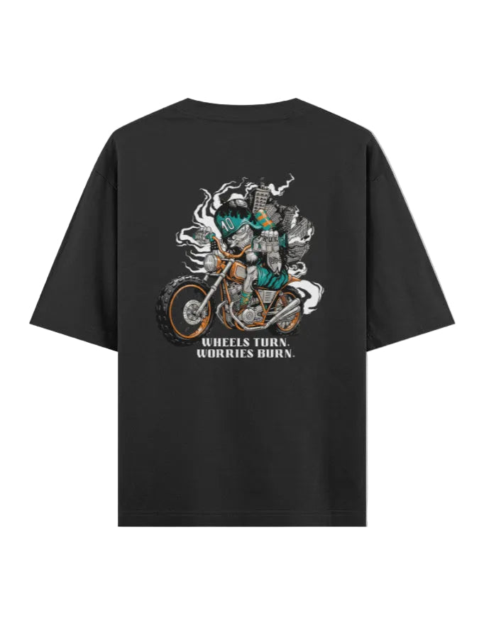 Black t-shirt with a graphic design of a person on a motorcycle and text on the back, on a white background.