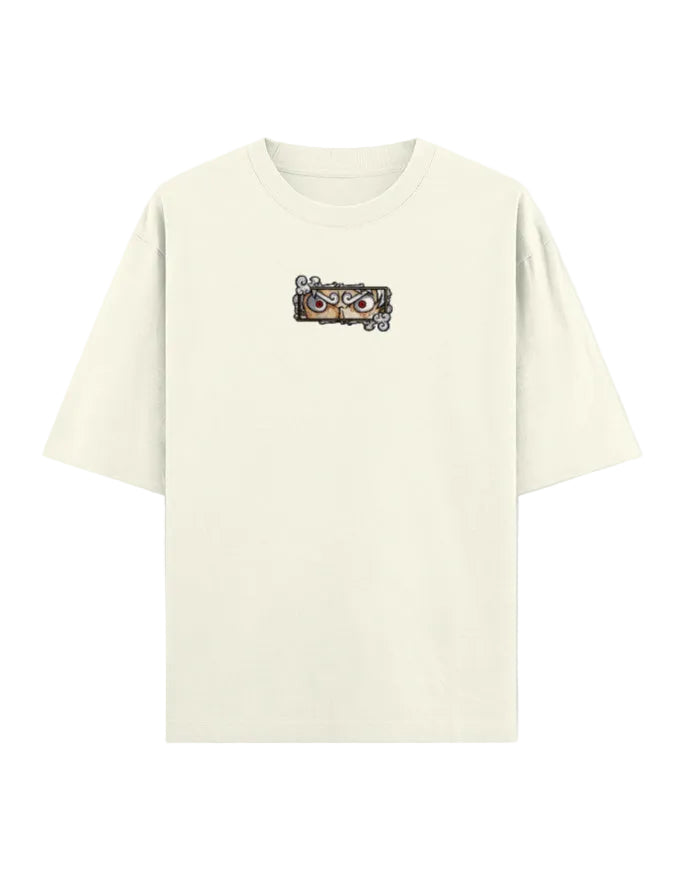 Beige t-shirt with a graphic design on a light gray background